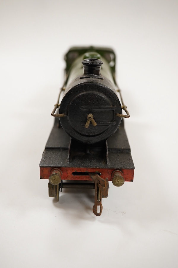 An 0 gauge Bing (or possibly Carette) for Bassett-Lowke tinplate clockwork GNR 4-4-2 tender locomotive, 1442, with original clockwork mechanism in yellow and black lined green livery